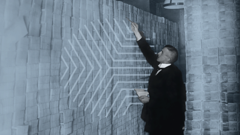 Man in 1920s attire pointing at a wall built from hyperinflated currency during the Weimar Republic era, illustrating the extreme devaluation of money.
